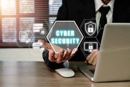 Firewall and internet security concept, Person hand touching VR screen protection icon on office desk, Data protection and network security, insurance business.の写真素材