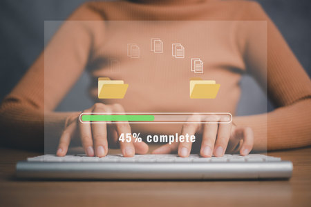 Transfer files data system relocation concept, Person hand using laptop computer waiting for...