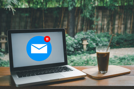 Email marketing concept, Laptop computer with email icon on screen, e-mail communication marketing,...