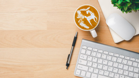 Top view, Office desk with keyboard computer, pen, mouse and notebook, copy space, Mock up.の写真素材