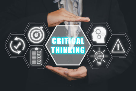Critical thinking concept, Business person hand holding critical thinking icon on virtual screen, Business person concentrated on critical thinking.の写真素材