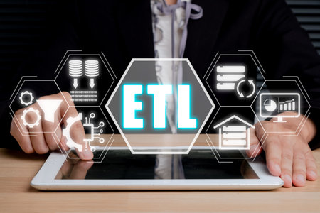 ETL extract transform load concept, Person using digital tablet with extract transform load icon on virtual screen.の写真素材