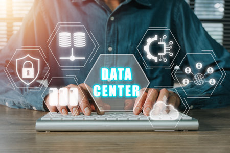 Data Center concept, Person hand typing on keyboard computer with data center icon on virtual screen, Cloud computer,Connection, Hosting, Server, Database.の写真素材