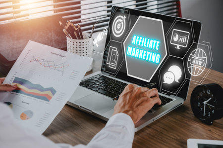 Affiliate marketing concept, Business person analyzing financial data on laptop computer with affiliate marketing icon on virtual screen, Digital Marketing content planning advertising strategy.の写真素材