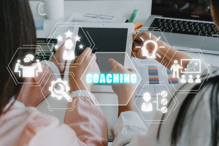 Coaching concept, Business person team working on laptop computer with coaching icon on virtual screen, Mentoring, Education, Business, Training, Development, E-learning.の写真素材
