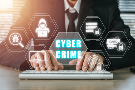 Cyber crime concept, Person hand typing keyboard computer with cyber crime icon on virtual screen.の写真素材