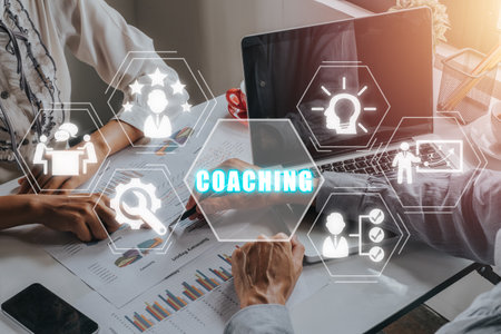 Coaching concept, Business person team working on laptop computer with coaching icon on virtual screen, Mentoring, Education, Business, Training, Development, E-learning.の写真素材