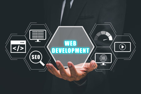Web development coding programming internet technology business concept, Businessman hand holding web development icon on virtual  screen.の写真素材