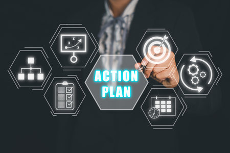 Action plan strategy vision planning direction concept, Business person hand touching action plan icon on VR screen.の写真素材