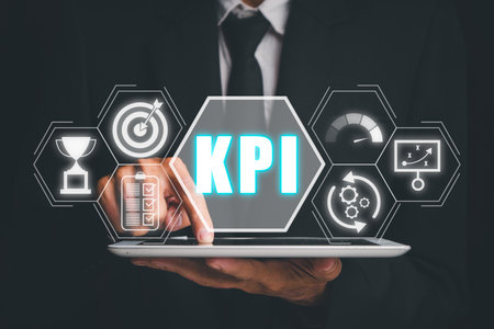 KPI, Key performance indicator business and industrial analysis concept, Person using digital tablet with Key performance indicator icon on virtual screen.の写真素材