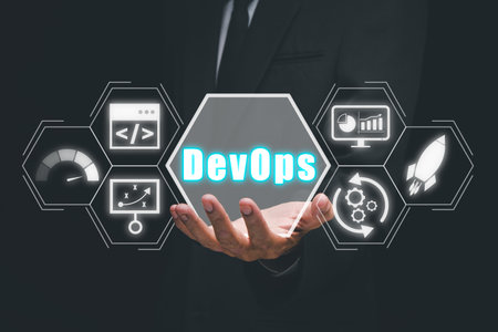 DevOps concept, Person hand holding DevOps icon on VR screen, Methodology development operations agil programming technology.concept.の写真素材