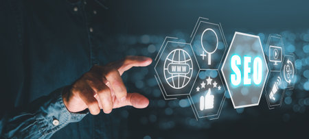 SEO Concept, Search Engine Optimization, Man hand touching virtual screen seo icon, concept for promoting ranking traffic on website, optimizing your website to rank in search engines.の写真素材