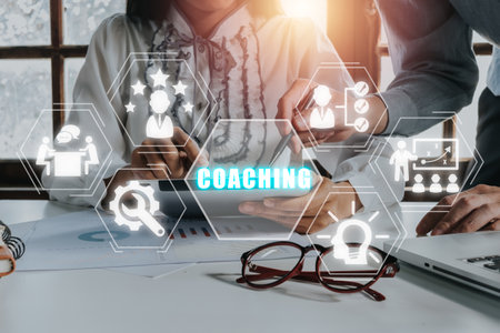 Coaching concept, Business person team working on laptop computer with coaching icon on virtual screen, Mentoring, Education, Business, Training, Development, E-learning.の写真素材