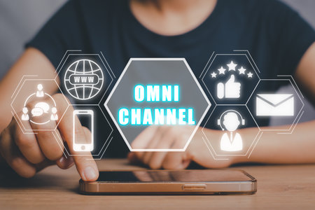 Omni channel concept, Person using smart phone on desk with omni channel icon on virtual screen.の写真素材