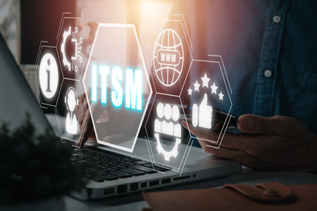ITSM, information technology service management concept, Business person working on laptop computer with information technology service management icon on virtual screen.の写真素材