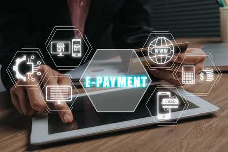 E-Payment Internet Banking Technology Concept, Person using tablet and credit card with E-Payment icon on virtual screen, Application, E-wallet, NFC, QR code, Digital money, digital banking.の写真素材