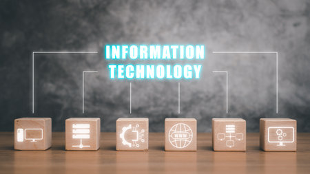 Information technology concept, Wooden block on desk with information technology icon on virtual screen.の写真素材