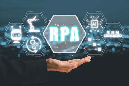 RPA Robotic Process Automation Innovation technology concept, Person hand holding VR screen RPA icon on office desk background.の写真素材