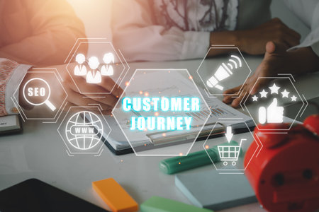 Customer journey concept, Business team analyzing income charts and graphs on office desk with customer journey icon on virtual screen.の写真素材