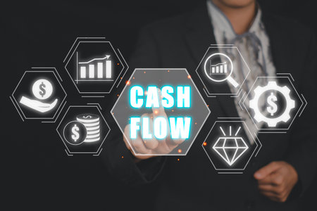 Cash flow concept, Business person hand select cash flow icon on virtual screen.の写真素材