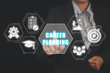 Career planning concept, Businesswoman hand touching career planning icon on virtual screen.の写真素材