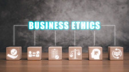 Business ethics concept, Wooden block on desk with business ethics icon on virtual screen.の写真素材