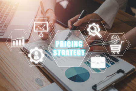 Pricing Strategy concept, Business team analysis summary graph reports of business operating expenses on desk with pricing strategy icon on virtual screen.の写真素材