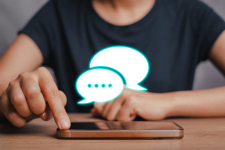 Message concept, Businesswoman using smartphone and holding a message icon, bubble talk notification...