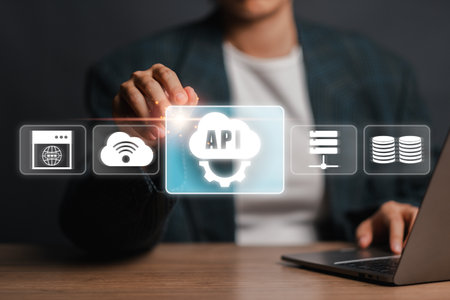A visual representation of the Application Programming Interface (API) concept, highlighting digital interface, cloud computing, and data integration for technology and software development.の写真素材
