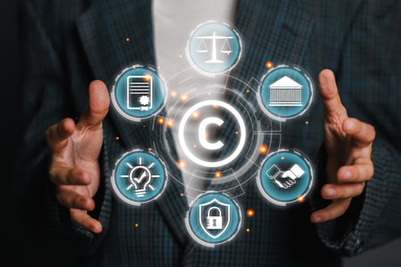 A visual representation of the copyright concept featuring icons related to law, ideas, and protection, emphasizing intellectual property rights.の写真素材