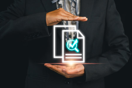 Business professional showcasing quality control with glowing document and checkmark icon, symbolizing assurance and standards.の写真素材