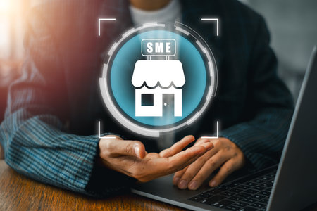 Visual depiction of SME concept with a business icon, highlighting technology and innovation in small and medium enterprises.の写真素材