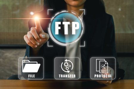 Businesswoman interacting with FTP interface, symbolizing digital file transfer technology and data exchange.の写真素材