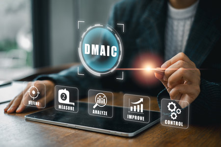 Visual representation of the DMAIC process for business improvement, showcasing digital interface elements and strategic planning.の写真素材