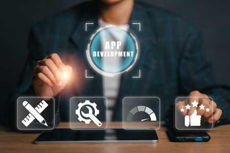 Digital interface showcasing app development with technology icons on a tablet screen, highlighting innovation and modern design.の写真素材