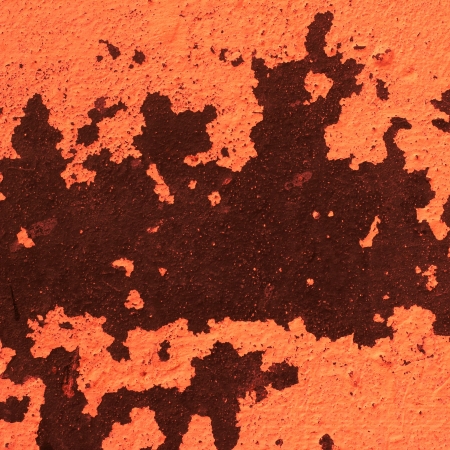 orange abstract texture old wall with cracks on the painの写真素材