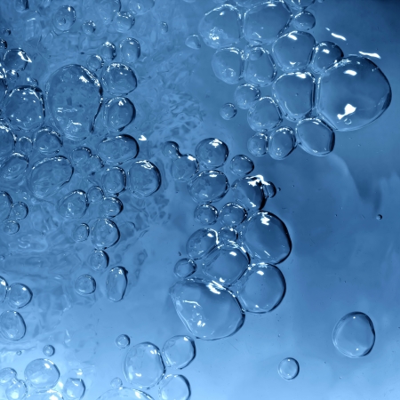 water splash drop bubbles blue texture backgroundの写真素材