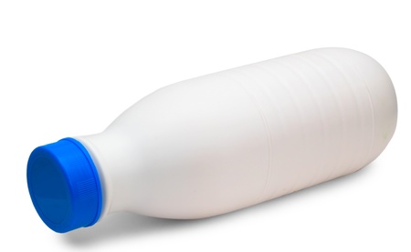 bread baplastic milk bottle lies side isolated on whiteの写真素材