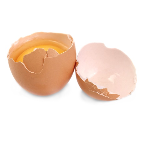 eggs smashed isolation against a white backgroundの写真素材