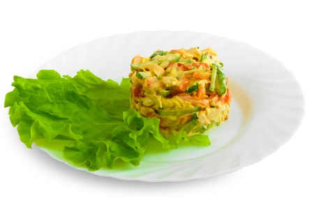 Salad of fresh cucumbers and tomatoes with chicken with fresh spinach, green leaf on white backgroundの写真素材