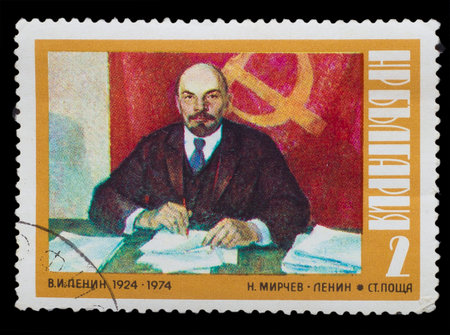BULGARIA - CIRCA 1974: A Stamp printed in Bulgaria, shows AN artist Mirchev painting "Lenin village Poscha", circa 1974のeditorial素材