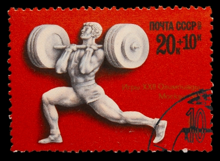 USSR - CIRCA 1980: A stamp printed in USSR,  games Moscow 1980 weightlifting, circa 1980のeditorial素材