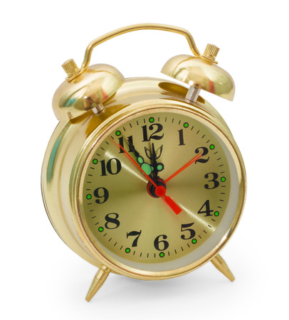 alarm a clock yellow gold isolated on white backgroundの写真素材