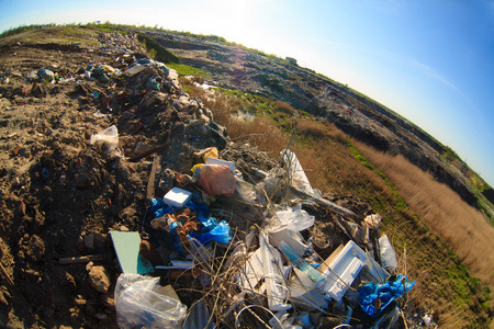 pile of garbage and plastic waste at the dump landfill pollutionの写真素材