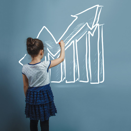 Teen girl of European appearance five years, wrote in the air aの写真素材