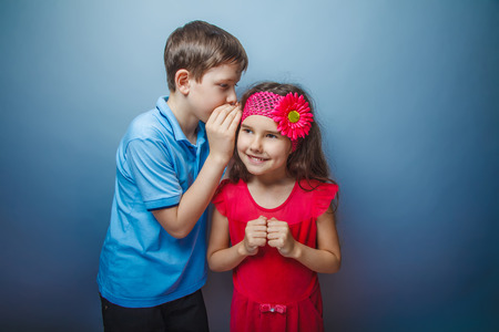 boy teenager European appearance in a blue shirt brown hair whisの写真素材