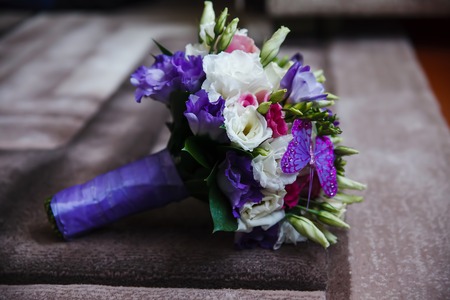 Wedding bridal bouquet lying on the floor in largeの写真素材
