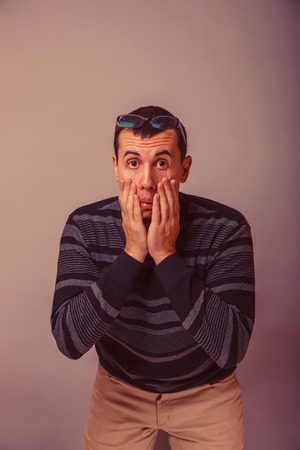 European-looking woman  of 30 years surprised upset retroの写真素材