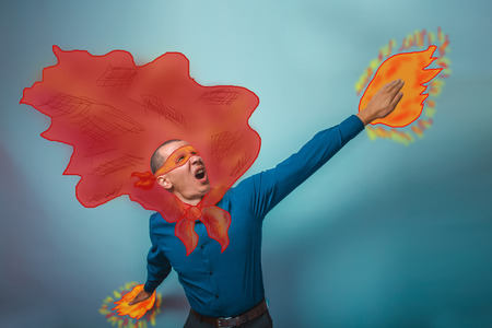 superhero  businessman man raised his hands superpower flying behind a cloak photo sketch studioの写真素材