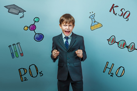teacher boy chemistry teenage student businessman shouts clenched his fists infographics formula sketchの写真素材